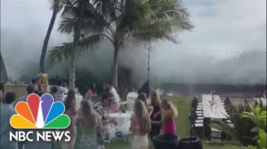 Watch: Large Waves Crash Over Seawall, Wipe Out Part Of Outdoor Hawaiian Wedding