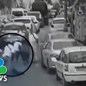 Israeli police say 13-year-old Palestinian boy shot Israeli father and son