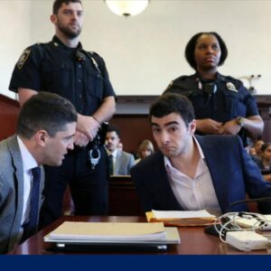 Mangione returns to court for a sixth day