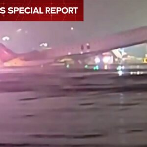 At least four injured in collision between plane and vehicle at NYC LaGuardia Airport