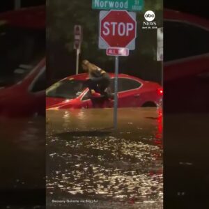 Driver climbs out car window to escape Fort Worth flooding