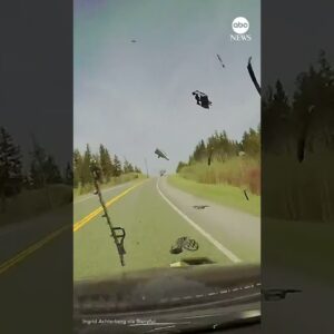 Boat goes flying off truck and smashes into oncoming car
