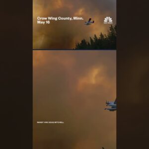Video shows a forest fire raging as firefighting planes battle the blaze