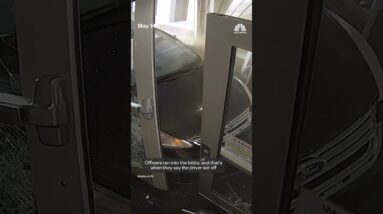 Footage captures a man crashing his car into an Alaskan police station