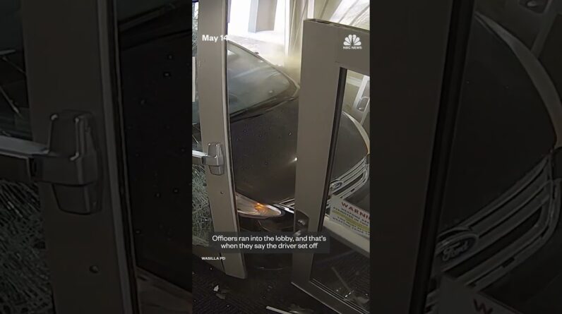 Footage captures a man crashing his car into an Alaskan police station
