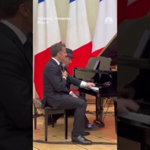 Macron sings at state dinner with Armenian PM on drums