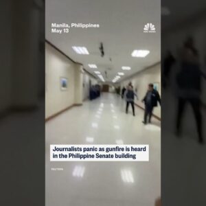 Journalists panic as gunfire is heard in the Philippine Senate building