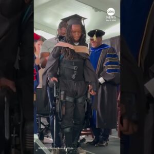 Paralyzed graduate defies odds and walks stage with robotics