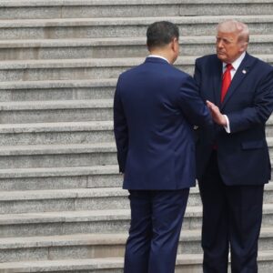 Trump shakes hands with Xi at start of historic U.S.-China summit