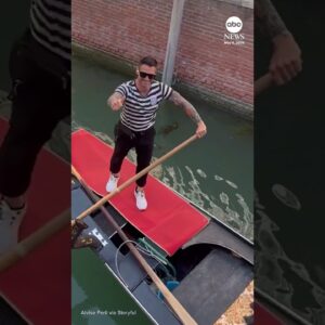 Venice gondolier shows off soccer skills in canal-side kickabout