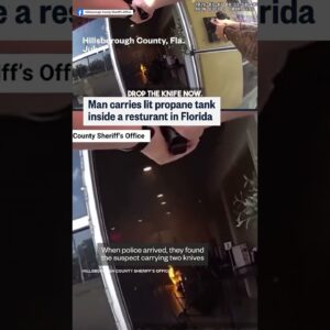 Man carries lit propane tank into Florida restaurant