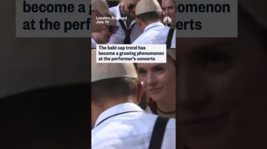 Fans at a Pitbull concert in London set the record for largest gathering of people with bald caps