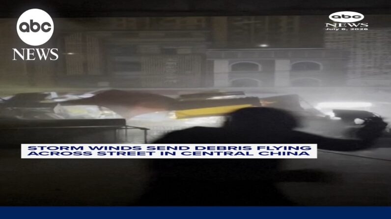 Powerful winds send debris flying down street in China